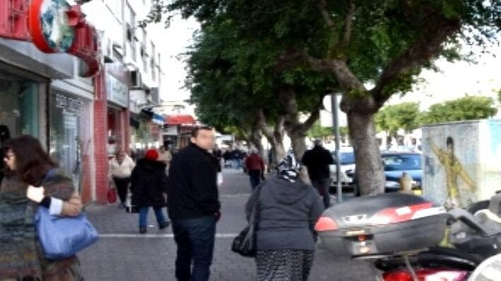 רחוב הרצל נתניה בעבר. בעלי עסקים מוחים