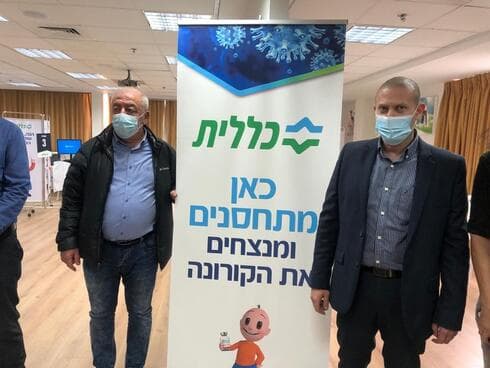 רונן נודלמן ודוד אבן צור במתחם החיסונים
