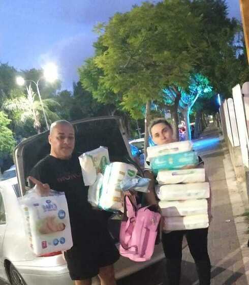 "התאהבנו בנתינה". שלומי וריקי אבוטבול "התאהבנו בנתינה". שלומי וריקי אבוטבול
