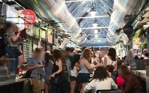  שוק מחנה יהודה. למצולמים אין קשר לכתבה