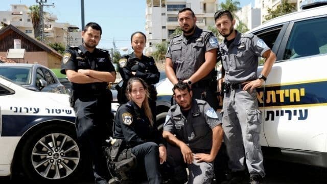 חלק מהפקחים והשוטרים העירוניים, השבוע