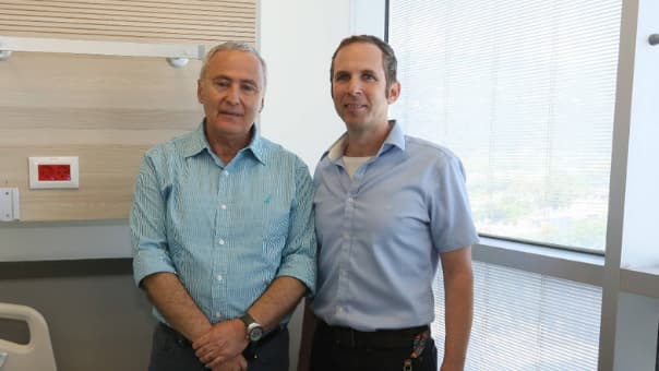 מימין: קובי בוסל ואריה ברקוביץ
