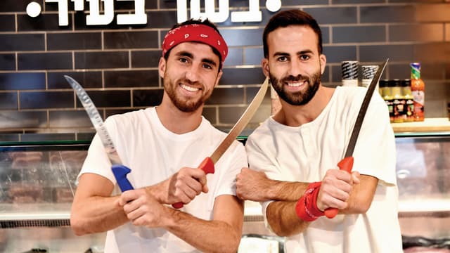 "הרבה כוח רצון". פיני בוימן (משמאל) ושותפו רם בוארון