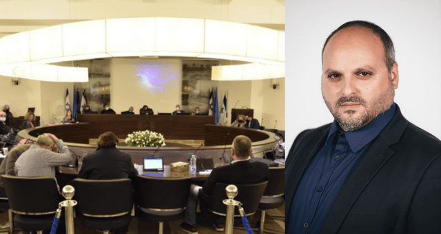 דרור אוחנה על רקע מועצת העיר חיפה