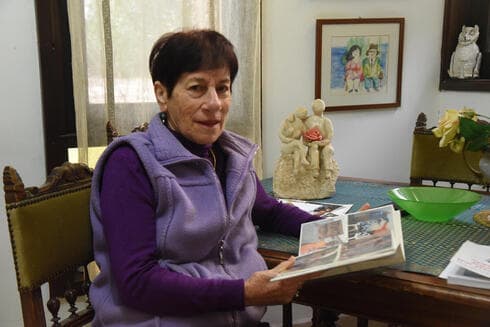 שלו עם אלבום התמונות