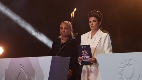 שירה איסקוב ועדי גוזי מדליקות משואה