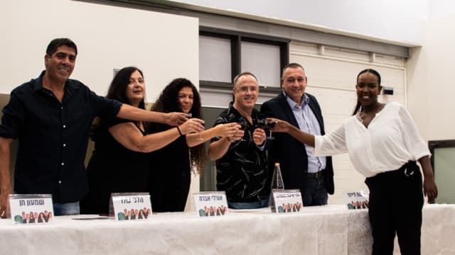 חברי "התושב במרכז" בכנס