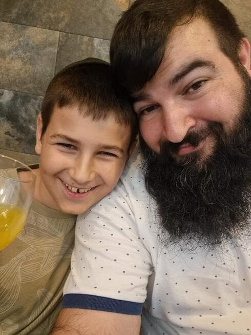 מנחם מענדל בולטון עם אביו