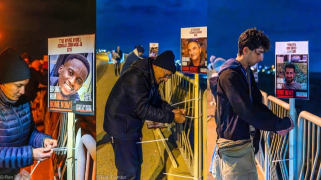 שלטי החטופים והחטופות שנתלו בחיפה