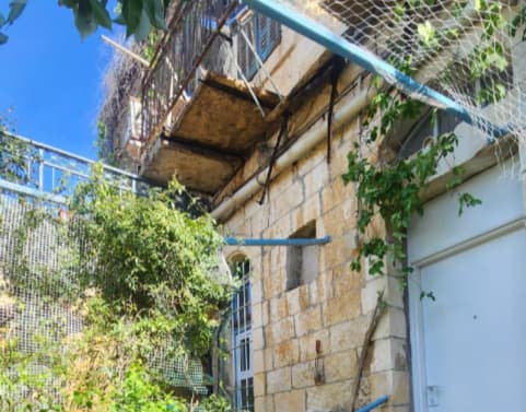 הבניין שבו קרסה המרפסת
