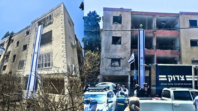 דגלי ישראל שנתלו על הבניינים שנפגעו בנווה שאנן