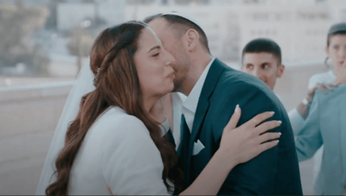 חתונה ירושלמית בין האזעקות (צילום מסרטון החתונה: פנדה וידאו ארט) חתונה ירושלמית בין האזעקות