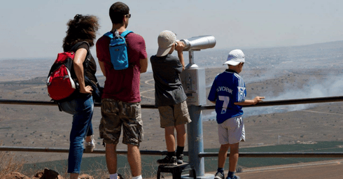 לתת תחושה שהמצב לא השתנה. מטיילים על גבול סוריה, צילום: אפי שריר
