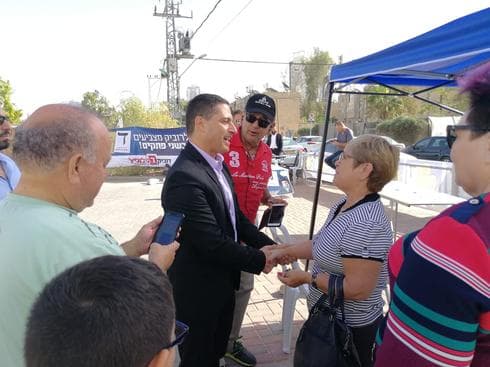 רוביק דנילוביץ' ומצביעים. צילום: דניאל כהן