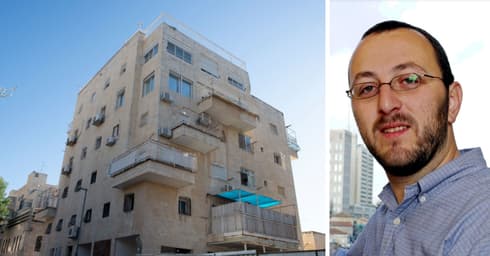 איציק קויפמן והבניין. צילום ארכיון: סבסטיאן שיינר, יואב דודקביץ'