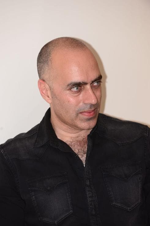 נדב דלומי."ההורים תמיד דחפו אותנו לעסוק במוזיקה. צילום: הרצל יוסף