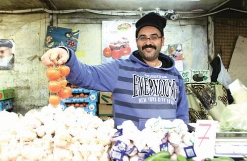   רוכלים בשוק. "המבקר הופך מצופה למשתתף" | צילום: אסף פרידמן