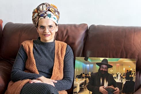 יעל שבח לצד תמונת בעלה רזיאל ז"ל. "יש הרבה מה ללמוד ממנו"  | צילום: אסף פרידמן