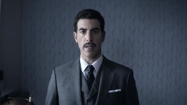 Sasha Baron Cohen caracterizado como Eli Cohen. 