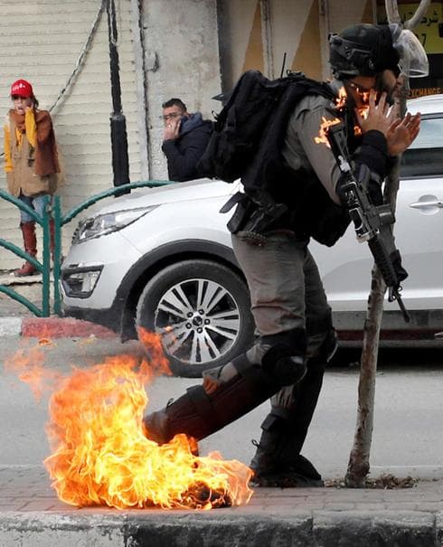 Policía Hebron Fuego