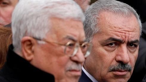 El primer ministro palestino Mohammad Shtayyeh y el presidente Mahmoud Abbas. (Reuters) El primer ministro palestino Mohammad Shtayyeh y el presidente Mahmoud Abbas.