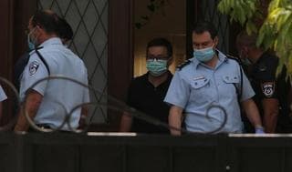 Agentes de la policía en lugar donde falleció el embajador chino.