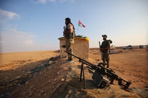 Combatientes pro-iraníes en Siria, cerca de la frontera con Irak.