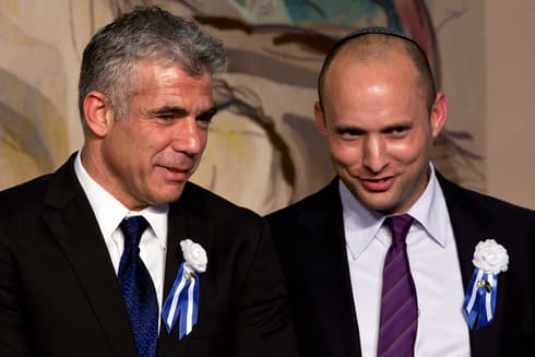 Los líderes de Yehs Atid, Yair Lapid, y Yamina, Naftali Bennett. 