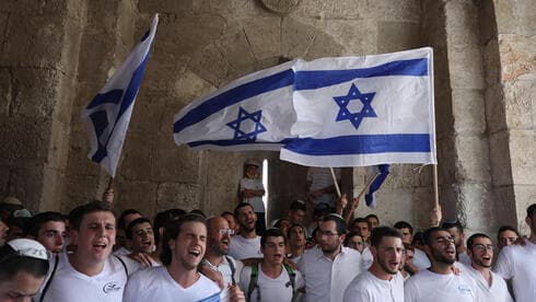 El "Desfile de la Bandera" anual en Jerusalem fue interrumpido en mayo debido al lanzamiento de cohetes desde Gaza. (EPA) El "Desfile de la Bandera" anual en Jerusalem fue interrumpido en mayo debido al lanzamiento de cohetes desde Gaza.