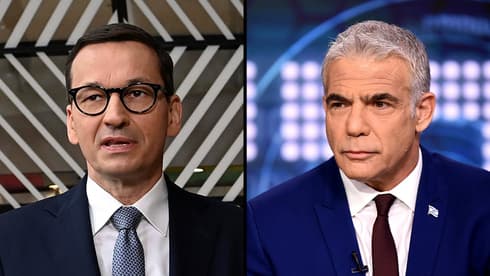 El ministro de Relaciones Exteriores israelí, Yair Lapid (derecha), y el primer ministro polaco, Mateusz Morawieck.