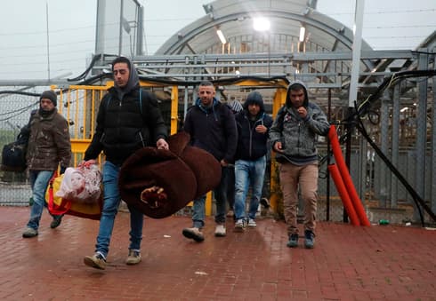 Trabajadores palestinos que ingresan a Israel desde Cisjordania. 