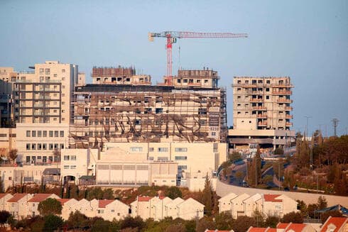 Construcción en el asentamiento Efrat.militar de Hamás tras el fin de los combates de mayo.en Ramat Gan tras el impacto de un cohete que dejó un muerto.
