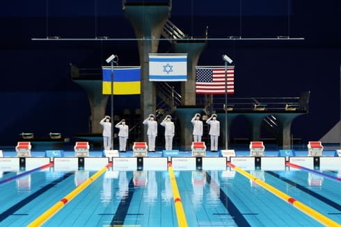 La bandera israelí junto a las de Ucrania y Estados Unidos tras la victoria de Mark Malyar en los Juegos Paralímpicos de Tokio. (Keren Isaacson) La bandera israelí junto a las de Ucrania y Estados Unidos tras la victoria de Mark Malyar en los Juegos Paralímpicos de Tokio.