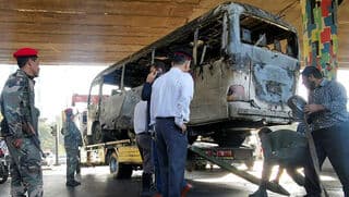 El autobús atacado en Damasco.