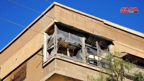 Edificio dañado por un misil antiaéreo sirio en la ciudad de Qudssaya, cerca de Damasco. (SANA) Edificio dañado por un misil antiaéreo sirio en la ciudad de Qudssaya, cerca de Damasco.