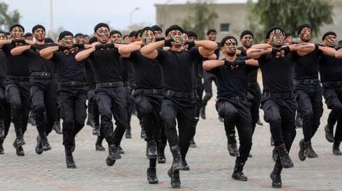Fuerzas de seguridad palestinas de Hamás en una ceremonia en la ciudad de Gaza el 12 de diciembre de 2021. (Flash90) Fuerzas de seguridad palestinas de Hamás en una ceremonia en la ciudad de Gaza el 12 de diciembre de 2021.