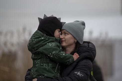 Refugiados ucranianos en la frontera polaca.
