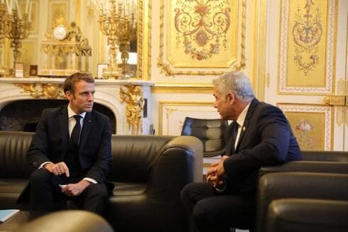 El presidente francés Emmanuel Macron y el primer ministro Yair Lapid. (Quentin Crestinu) El presidente francés Emmanuel Macron y el primer ministro Yair Lapid.