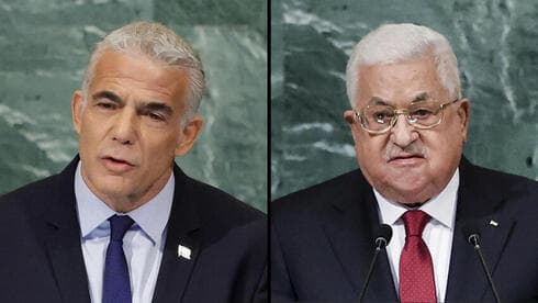El Primer Ministro Yair Lapid y Mahmoud Abbas