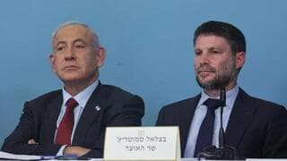 Benjamín Netanyahu y Bezalel Smotrich, socios de la coalición de gobierno. 