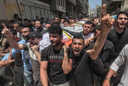 Funeral del comandante de la Jihad Islámica Ali Hassan Ghali y su hermano Muhammed en Gaza, el jueves. (AFP) Funeral del comandante de la Jihad Islámica Ali Hassan Ghali y su hermano Muhammed en Gaza, el jueves.