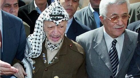 Yaser Arafat y Mahmoud Abbas.