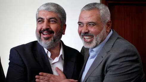 Khaled Mashaal e Ismail Haniyeh. 