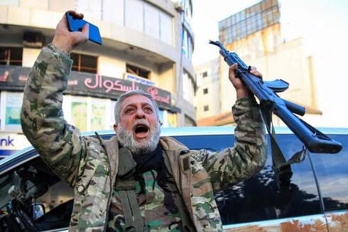 Rebeldes sirios en su llegada a Homs. 
