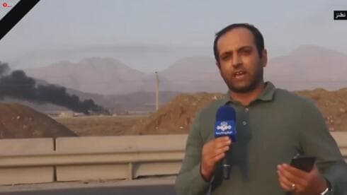 Periodistas de la televisión iraní informan del ataque