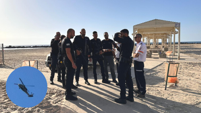 שוטרים וחבלני משטרה בחוף הים בחיפה