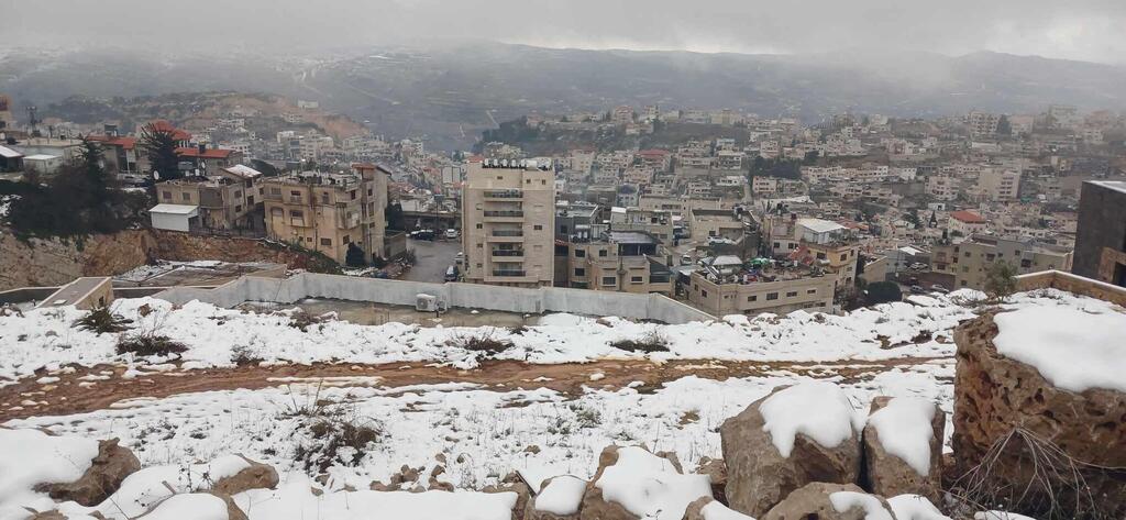 منخفض جوي وأمطار غزيرة 