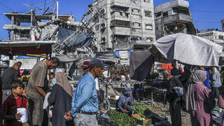 فلسطينيون في خان يونس، جنوب قطاع غزة