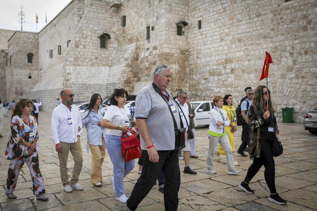 احتفالات اضاءة شجرة الميلاد في بيت لحم (فلاش 90) احتفالات اضاءة شجرة الميلاد في بيت لحم