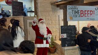 أجواء ميلادية مميّزة في سوق عيد الميلاد بقرية الجش